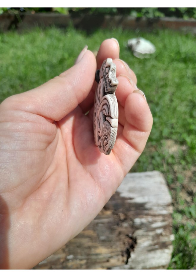 A triskelion amulet with heads of a Boar, Raven and Wolf. Norse, pagan jewelry. Norse mythology art. Altarpiece.