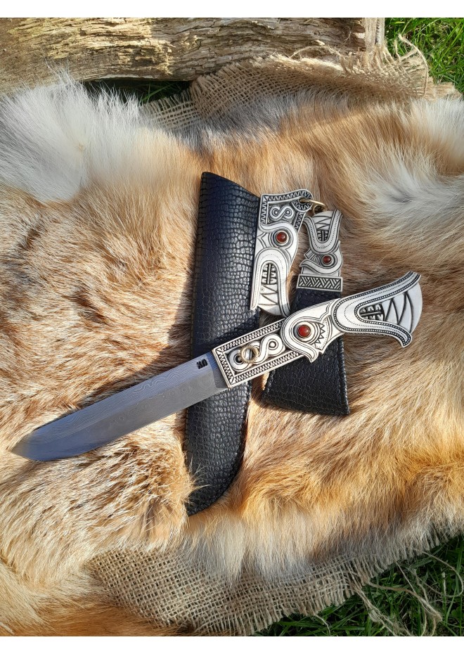 Anglo-Saxon period seax with leather sheath and knot motifs.