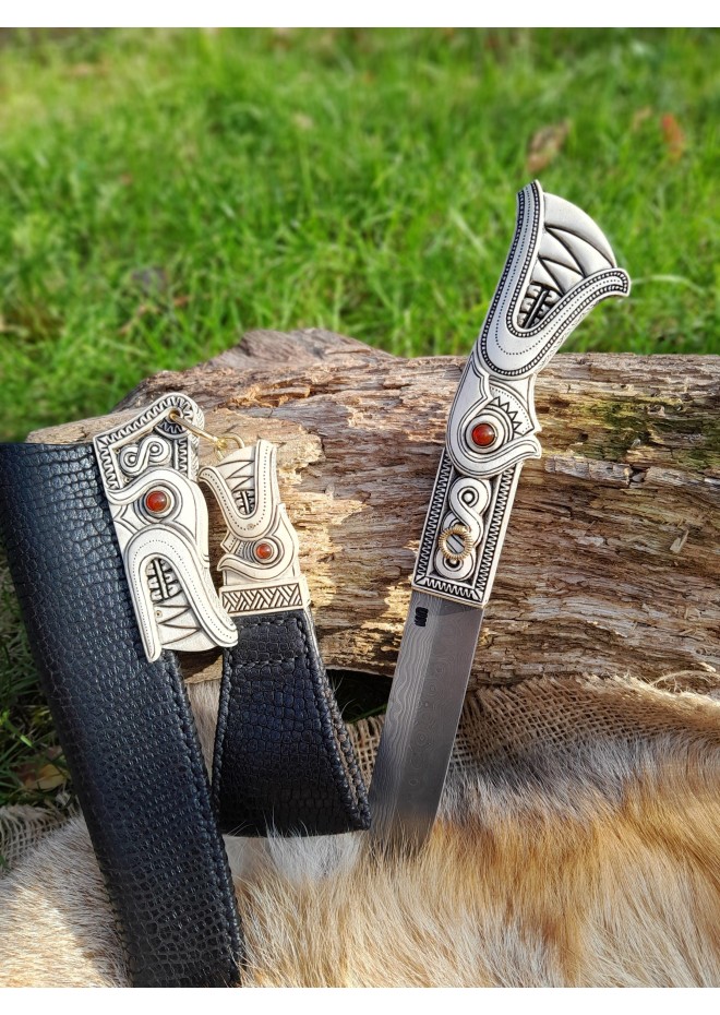 Anglo-Saxon period seax with leather sheath and knot motifs.