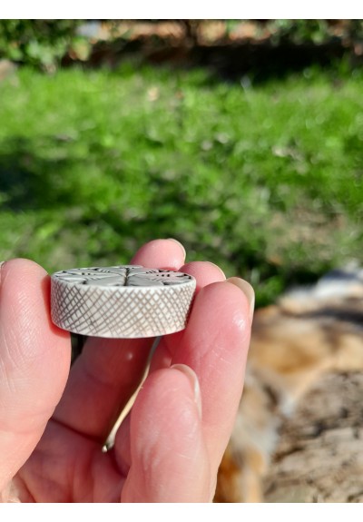 Hand-carved pendant with Ægishjálmr symbol. Helm of Awe amulet.