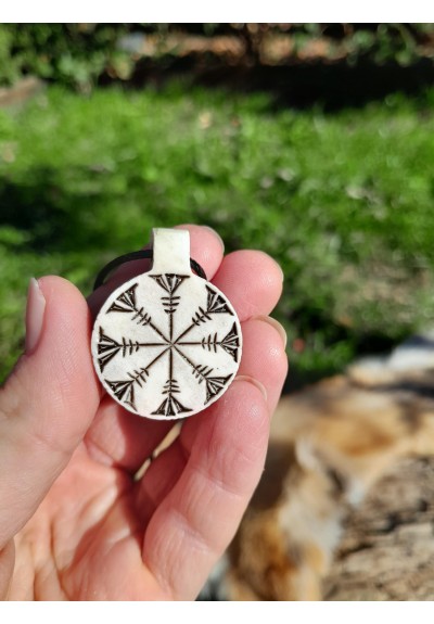 Hand-carved pendant with Ægishjálmr symbol. Helm of Awe amulet.