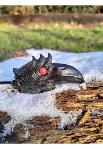 Hand-carved Viking black raven amulet with red eye and Algiz rune