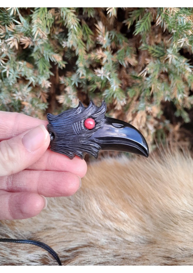 Scandinavian amulet: black raven with red eye and Algiz rune