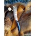 Custom Norse knife with wolf design and runes. Antler handle