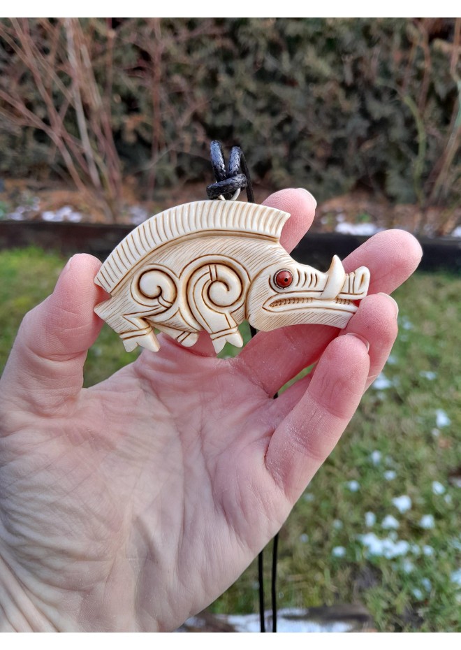 Hand-carved Celtic motifs wild boar amulet. Norse mythology