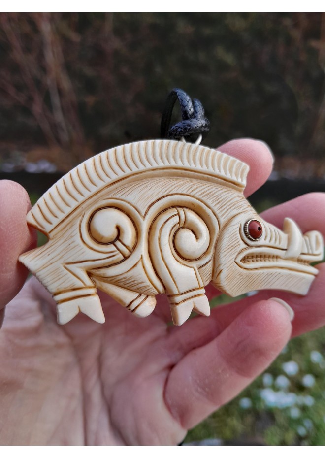 Hand-carved Celtic motifs wild boar amulet. Norse mythology