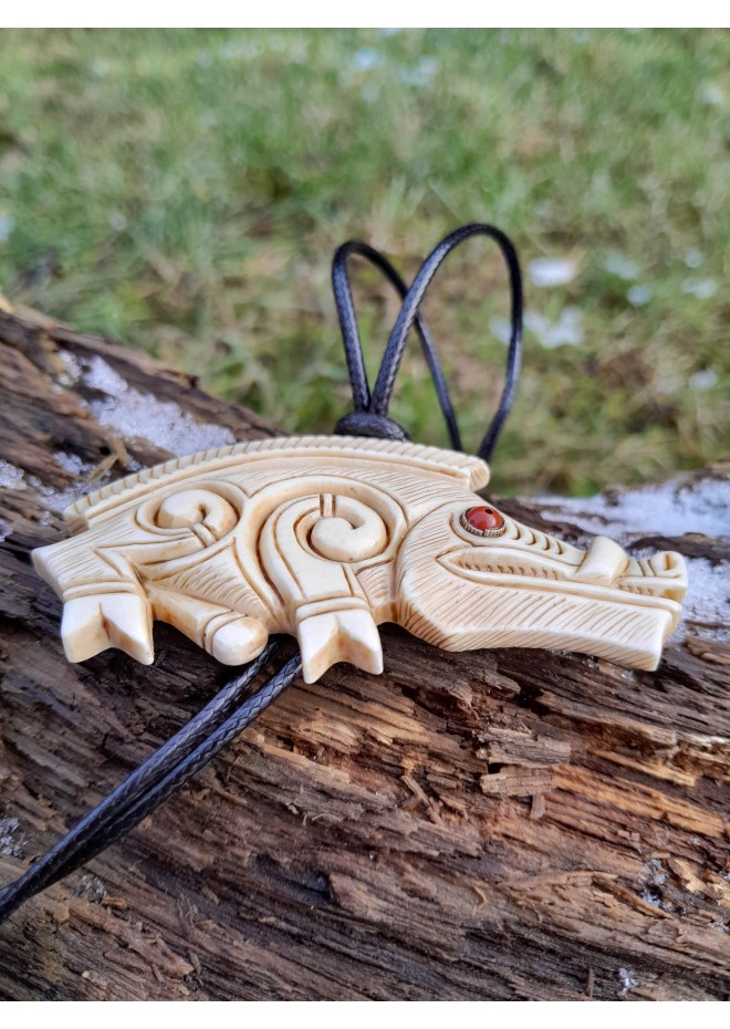 Hand-carved Celtic motifs wild boar amulet. Norse mythology