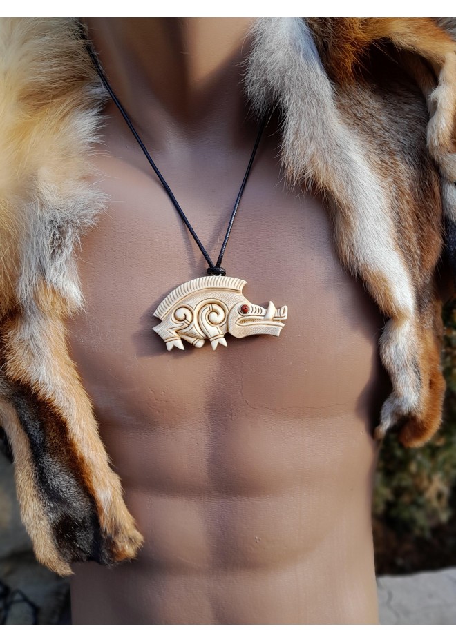 Hand-carved Celtic motifs wild boar amulet. Norse mythology