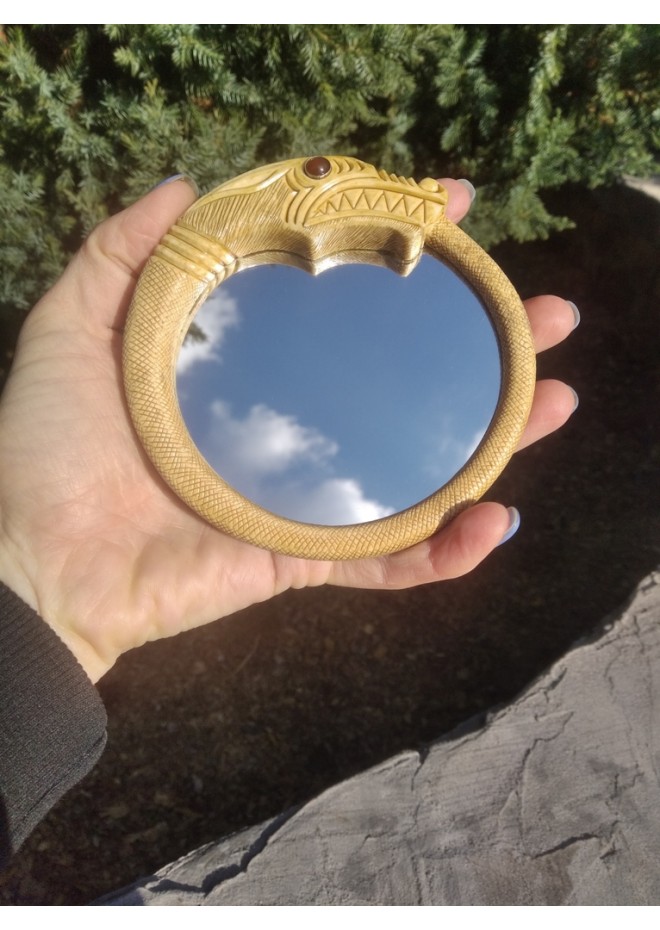 Viking mirror with Jormungand design