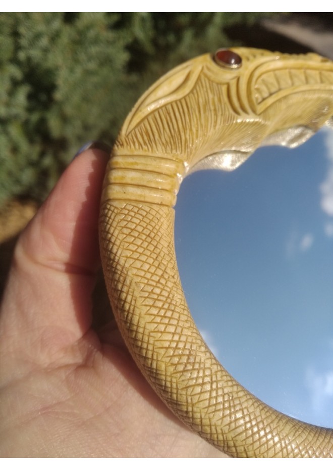 Viking mirror with Jormungand design