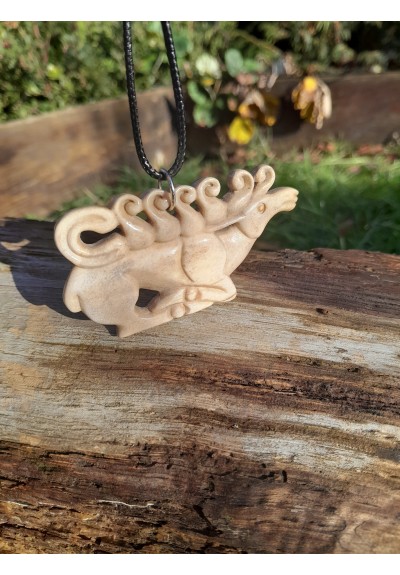 Scythian stag amulet. Moose antlers hand-carved. Reproduction of a Scythian plaque.