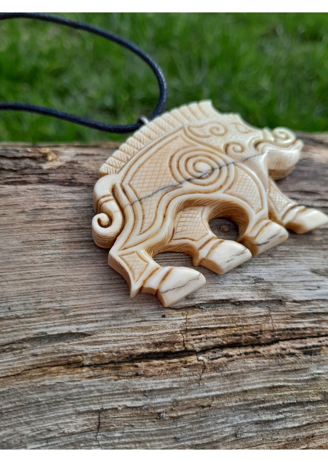 Hand-carved Boar amulet with Algiz rune.