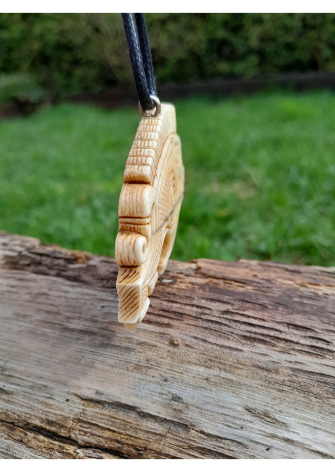 Hand-carved Boar amulet with Algiz rune.