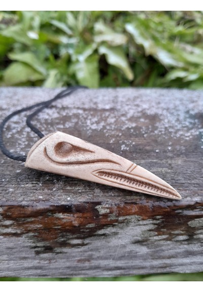 Hand-carved Viking raven skull amulet. Norse Raven of Odin jewelry.