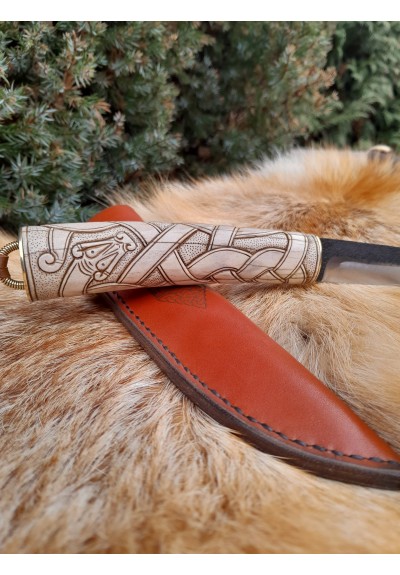 Beautiful hand-forged Viking knife with leather sheath and hand-carved handle. Dragon knotwork. Norse, Nordic design. Celtic art style.