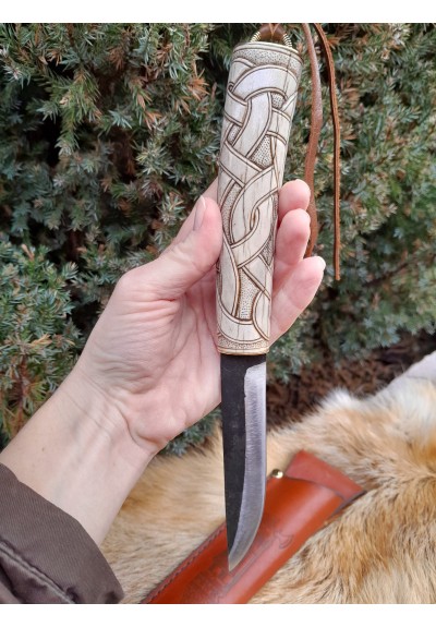 Beautiful hand-forged Viking knife with leather sheath and hand-carved handle. Dragon knotwork. Norse, Nordic design. Celtic art style.