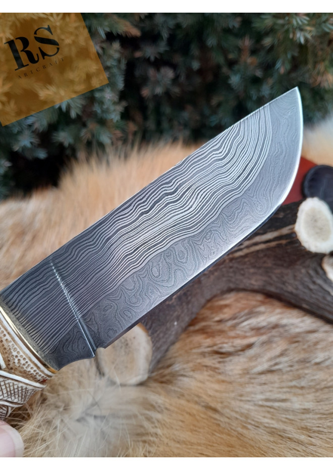 Viking knife with hand-carved antler handle. Damascus blade.