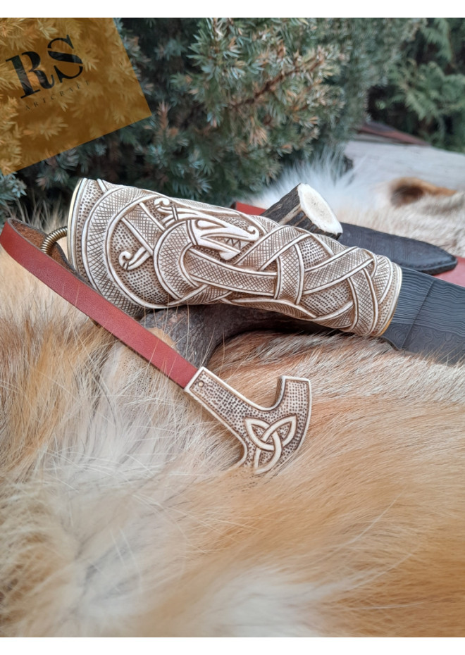 Viking knife with hand-carved antler handle. Damascus blade.