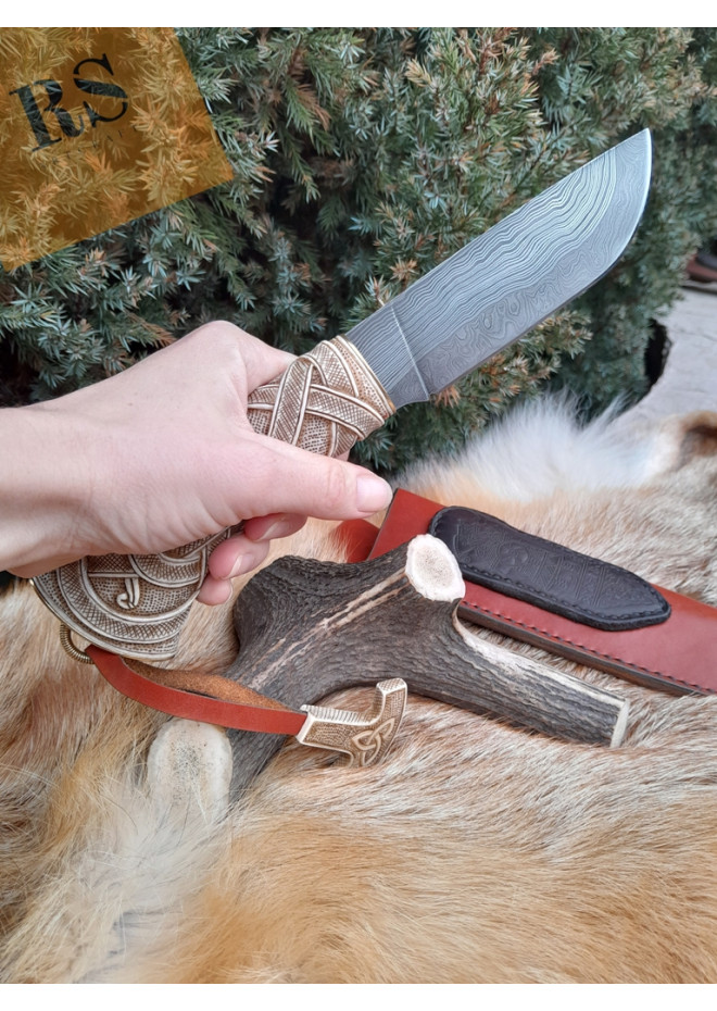 Viking knife with hand-carved antler handle. Damascus blade.