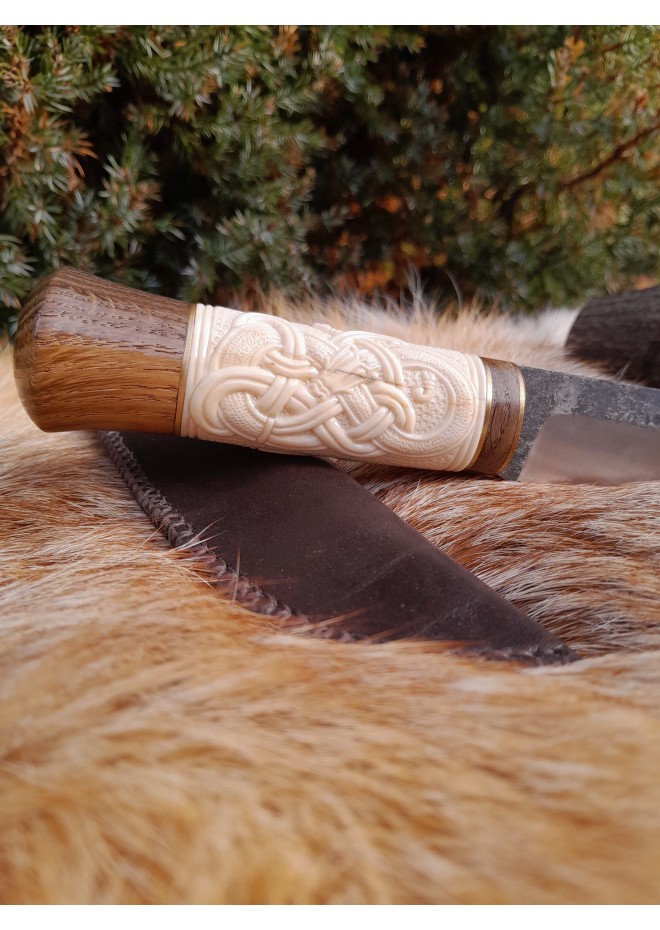 Norse Dragon knife. Moose antlers carved handle. Hand-forged blade