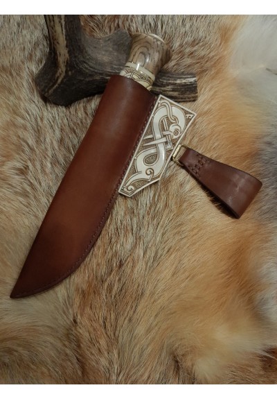 Handmade designer knife in the Norse style. Hand-carved handle with hand-forged Damascus blade, leather sheath. Viking zoomorphic knotwork