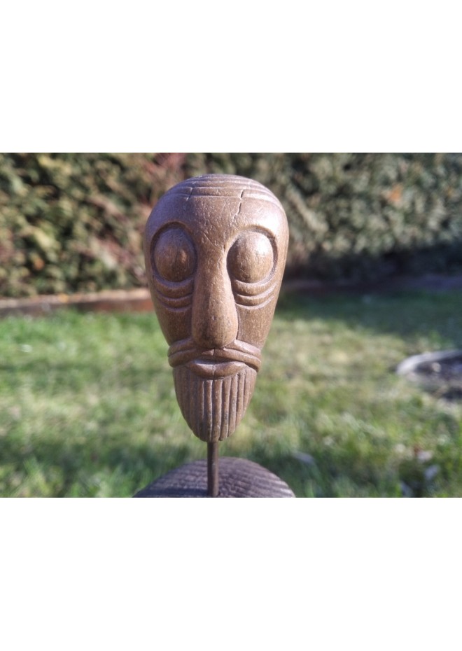 Oseberg hand-carved bearded man. Viking, pagan statue.