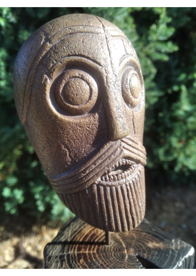 Replica hand-carved Viking head. The Oseberg Cart Burial