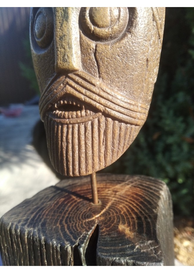 Replica hand-carved Viking head. The Oseberg Cart Burial