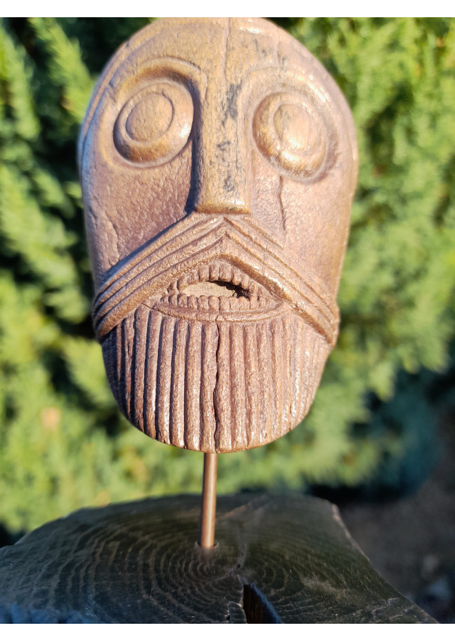 Replica hand-carved Viking head. The Oseberg Cart Burial