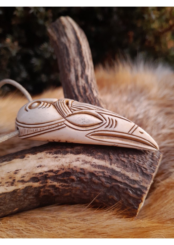 Hand-carved Viking Raven head amulet with Helm of Awe symbol and God Odin face.  