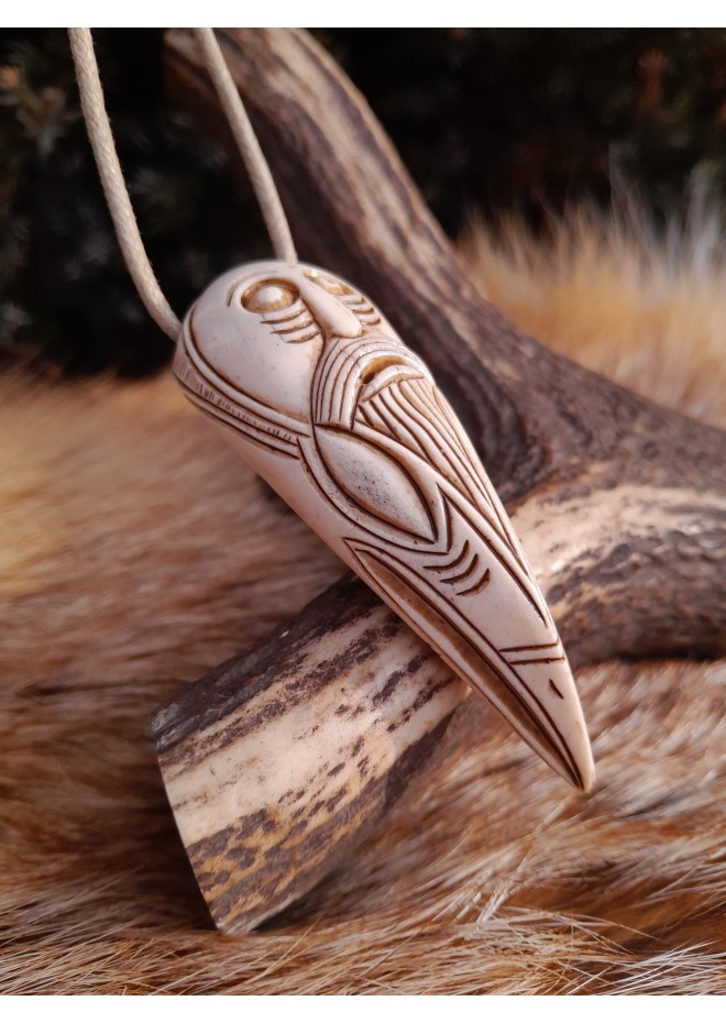 Hand-carved Viking Raven head amulet with Helm of Awe symbol and God Odin face.  