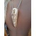 Hand-carved Viking Raven head amulet with Helm of Awe symbol and God Odin face.  