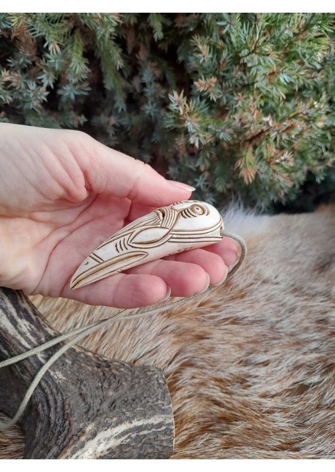 Hand-carved Viking Raven head amulet with Helm of Awe symbol and God Odin face.  