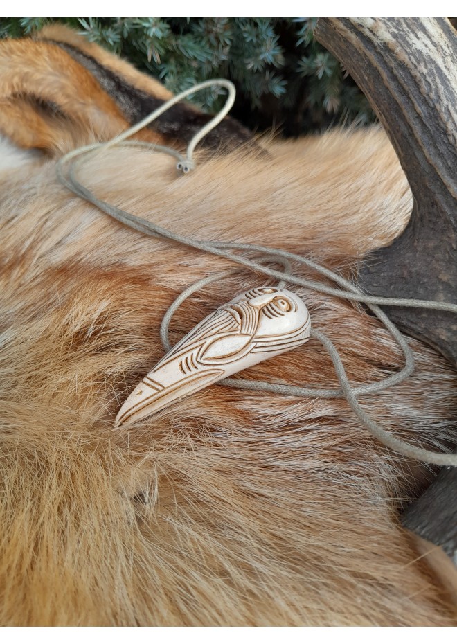 Hand-carved Viking Raven head amulet with Helm of Awe symbol and God Odin face.  