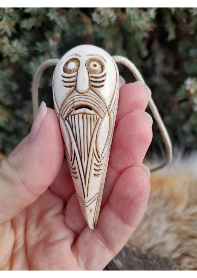 Hand-carved Viking Raven head amulet with Helm of Awe symbol and God Odin face.  