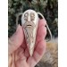 Hand-carved Viking Raven head amulet with Helm of Awe symbol and God Odin face.  