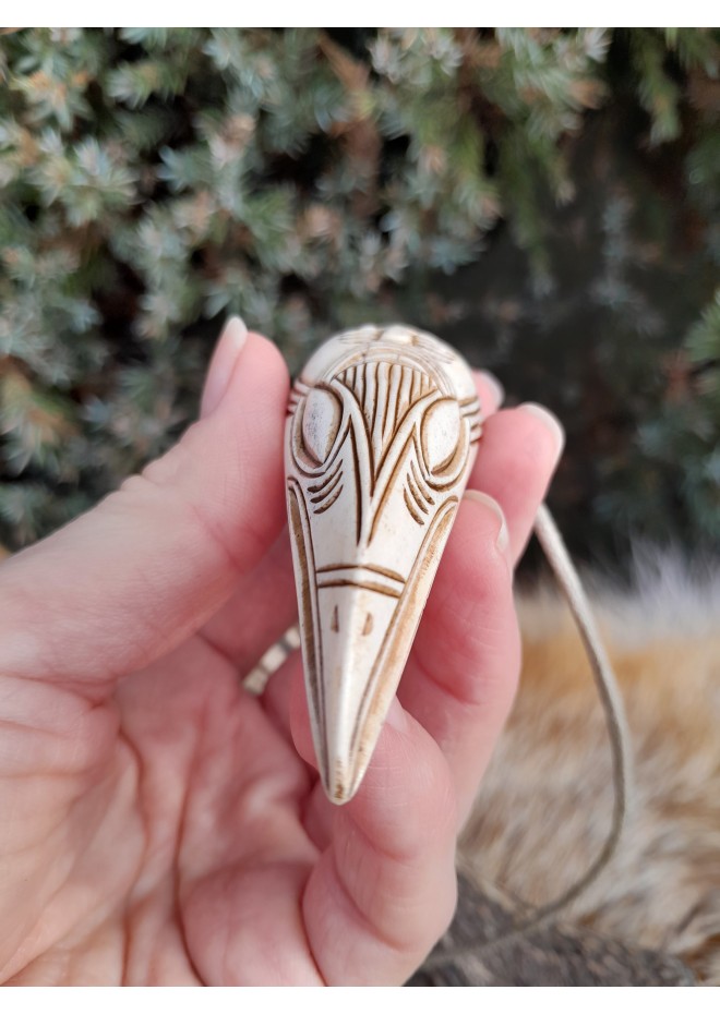 Hand-carved Viking Raven head amulet with Helm of Awe symbol and God Odin face.  