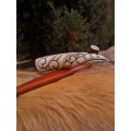 Viking style knife with hand-carved handle and leather sheath. Odin Raven head handle. Hand-forged blade.