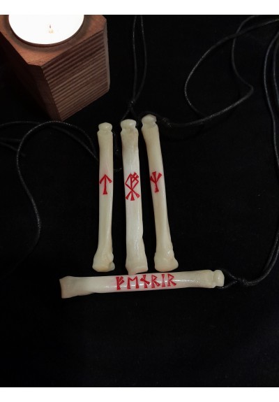 Handmade Wolf bone amulet with runes.