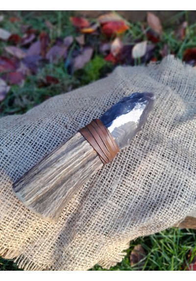 Handmade Neolithic ritual knife with flint blade (modern reconstruction). Primitive flint knapped dagger. Stone age. Pagan primal art