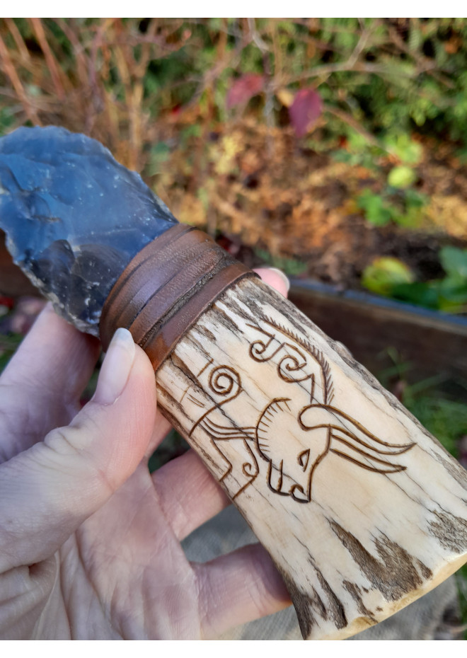 Handmade Neolithic ritual knife with flint blade (modern reconstruction). 